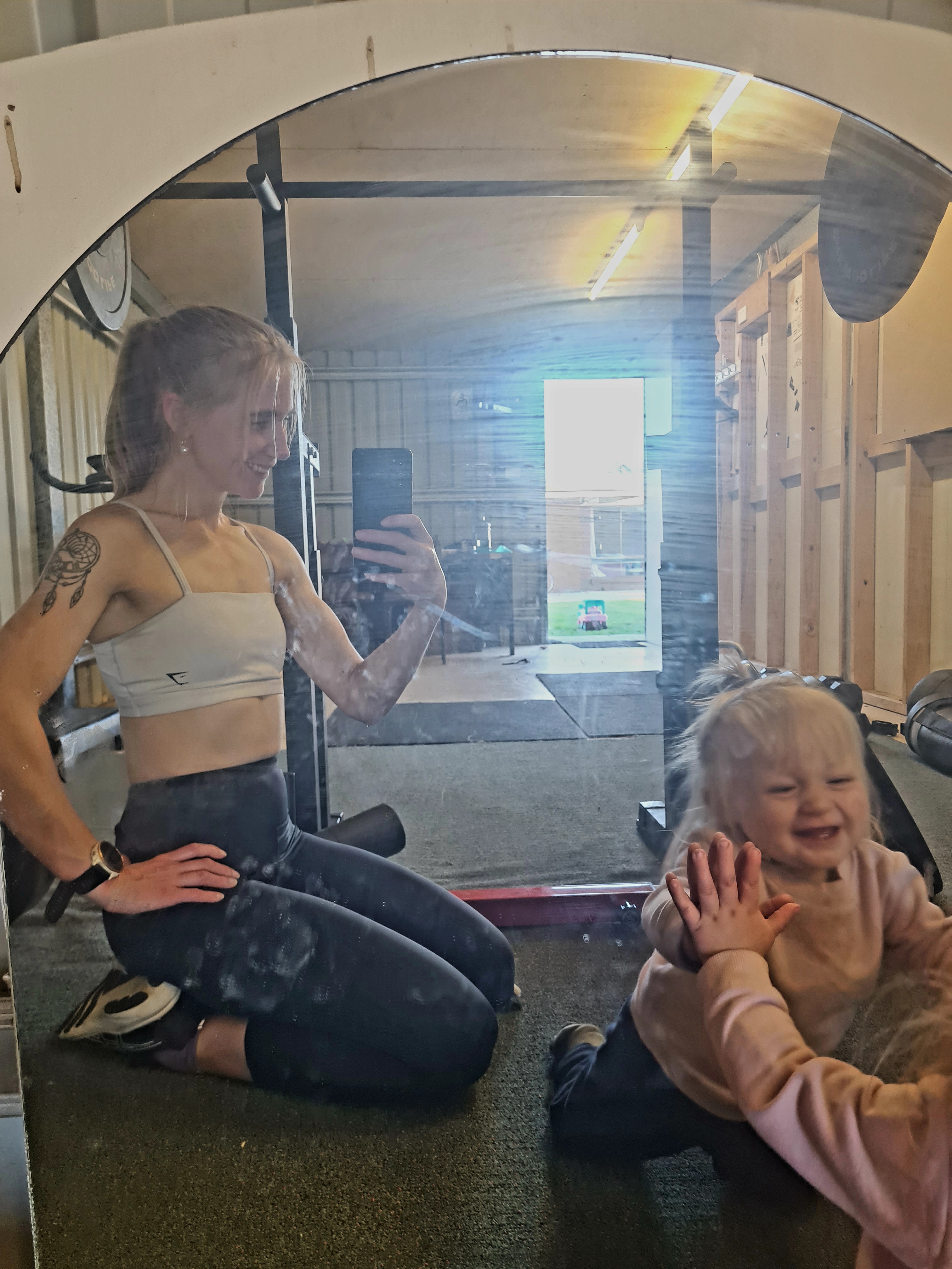Chloe training in her shed studio with her daughter